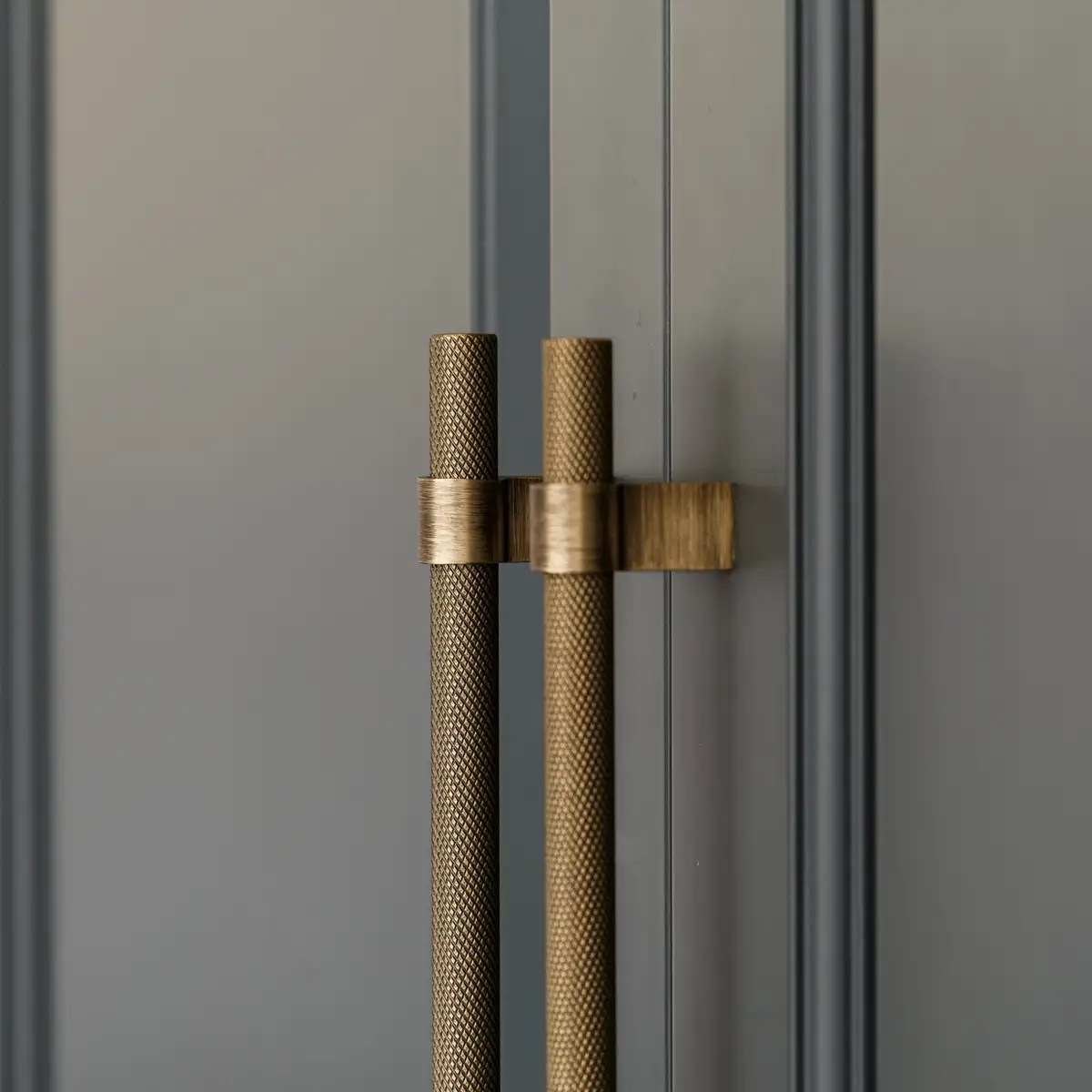 gold handles green furniture